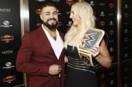 Andrade and Charlotte Flair